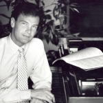 at_piano_bw_serious.jpg